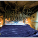 Illustration for article titled This fantasy-themed bed and breakfast lets you sleep inside a Trojan bull